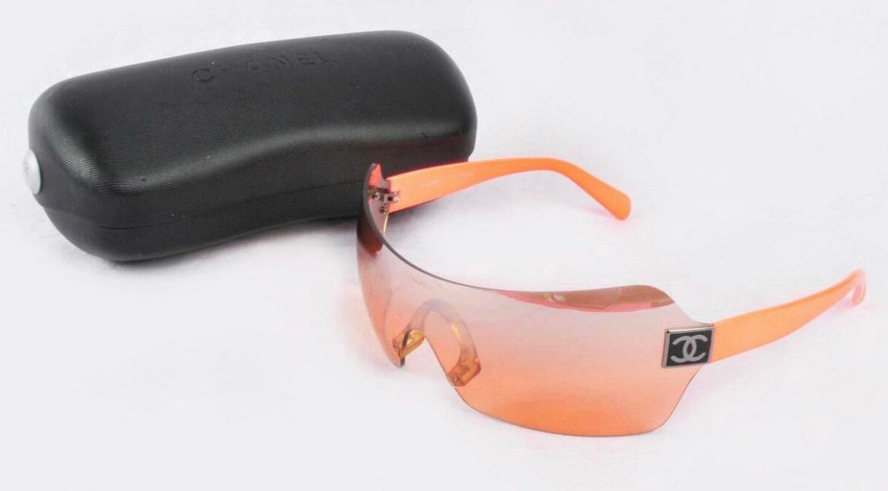 Chanel Clear Orange Rimless Sunglasses